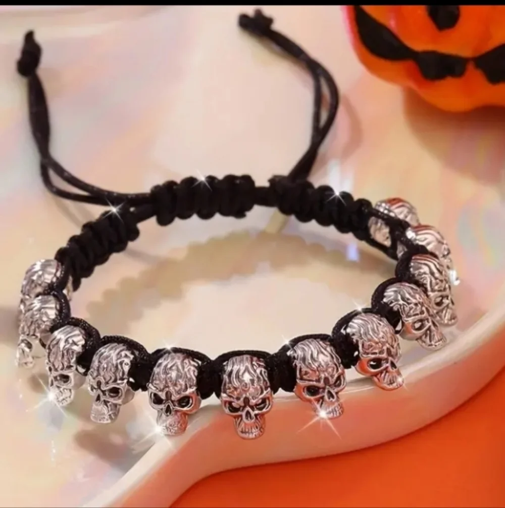 Silvertone Skull Bracelet Black Cord